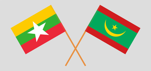 Crossed flags of Myanmar and Mauritania. Official colors. Correct proportion