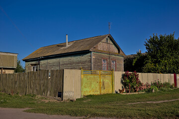 Traditional Ukrainian wooden old house. The village of Sedniv, Chernihiv region. Ukraine. One-story...