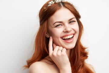 Fototapeta premium beautiful woman red hair decoration cosmetics close-up