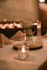 still life with candle and flowers
