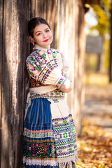 Young beautiful slovak woman in traditional dress. Slovak folklore