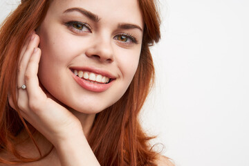 Fototapeta premium beautiful woman red hair decoration cosmetics close-up