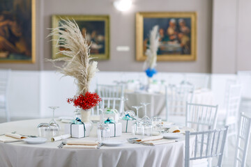 wedding bomboniere at a banquet, boxes with ribbons