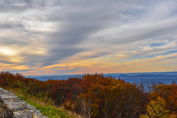 The Sun Sets Over the Blue Ridge Mountains on an Autumn Afternoon Highlighting the Beautiful Fall Foliage Colors
