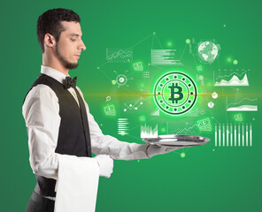 Handsome young waiter in tuxedo holding currency icons on tray