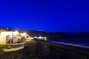 Small fishermen village in fuerteventura by night