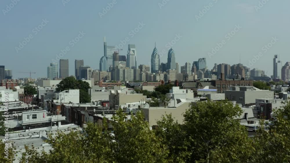 Wall mural Philadelphia Skyline Aerial Drone Footage Reveal From Trees 4K