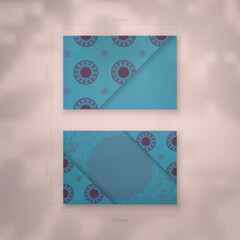 Turquoise business card template with vintage purple ornaments for your personality.