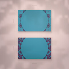 Turquoise business card with purple mandala ornament for your personality.