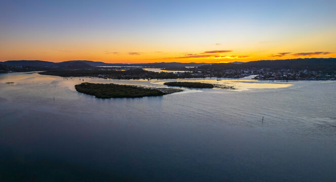 Sunrise aerial waterscape panorama