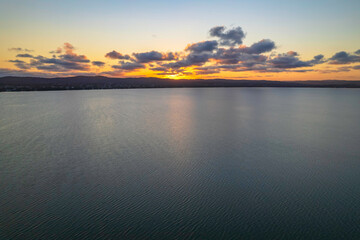 Fototapeta na wymiar Sunset reflections over the lake