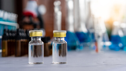 disease vaccine bottle concept of medicine and Close-up of a bottle of medicine or flu Disease vaccine bottle for immunization on medical background, medicine, and ancient medicine.