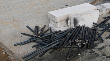 Pile of steel piles on the floor for building a house or building construction ideas.