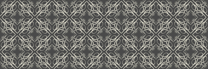 Beautiful background images with ornament in the style of a kaleidoscope on a black background for your design. Seamless background for wallpaper, textures.