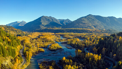 Aerial view of the Vedder Crossing in fall color in Chilliwack city, where the Vedder River changes its name to Chilliwack River, British Columbia, Canada