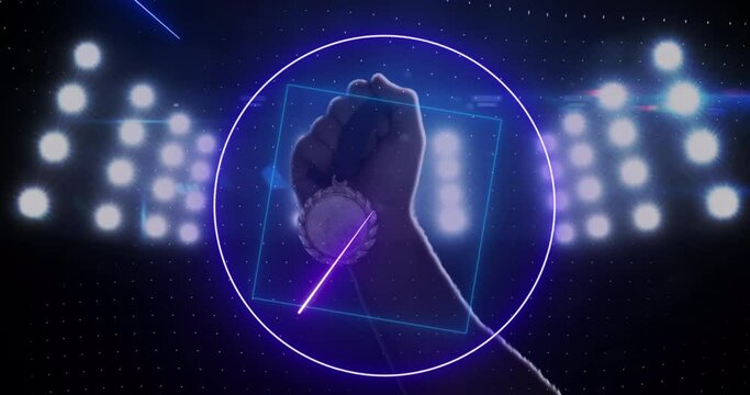Animation of purple neon scanner processing data over hand holding medal in floodlit sports stadium