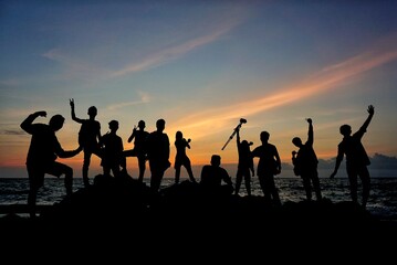 Fototapeta na wymiar people on the beach at sunset