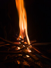 Starting a fire with kindling at night