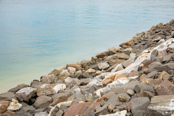 Fototapeta na wymiar Rocks and Stones on Beach.Relaxation Landscape Viewpoint