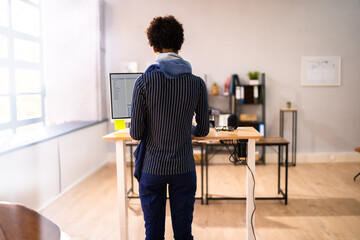 Adjustable Height Desk Stand In Office