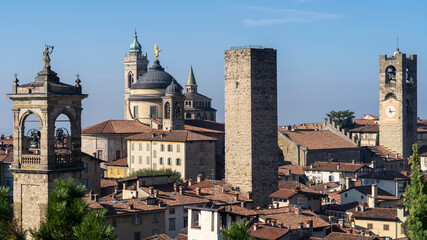 Fototapeta na wymiar Bergamo, Italy. The old town. Landscape at the city center, the old towers and the clock towers from the ancient fortress called La rocca. Bergamo best of Italy and touristic destination