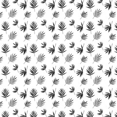 Black and white tropical palm leaves seamless pattern. Vector illustration.