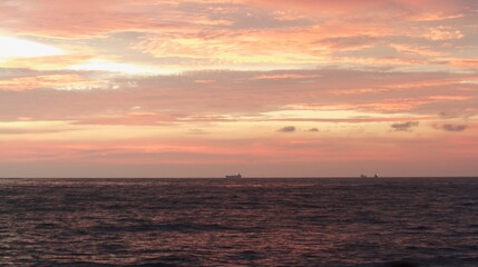 horizon from the seashore during golden hour in the evening