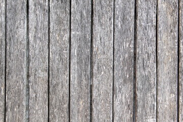 Wooden board made of gray planks. Texture vertically.