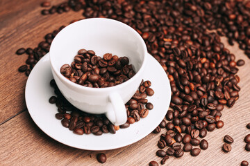 a cup of coffee Hot drink spilled grains photograph of the object