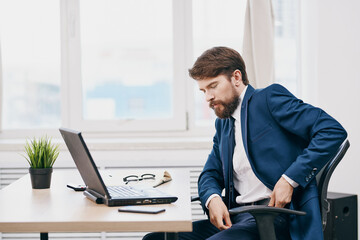 businessmen in the office in front of a laptop executive success