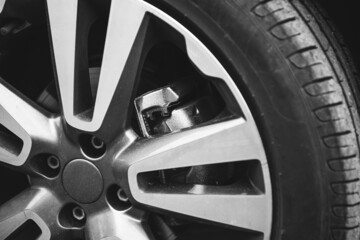 Fototapeta na wymiar gray alloy wheels, racing car drift, sports car. extreme sport