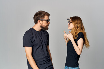 fashionable man and woman socializing together posing fashion isolated background