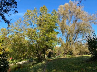 Naklejka premium Early autumn landscape in parks and along recreational trails in the city of Zürich (Zuerich or Zurich), Oerlikon - Switzerland (Schweiz)