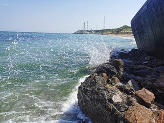 waves crashing on rocks