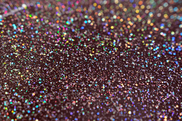 Dark Blurred glitter background. Festive lights. New Year background