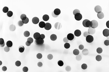 black particles on a white background