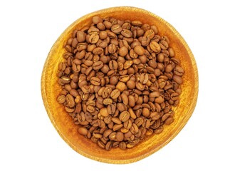 Coffee beans lie on a white background in a shallow wooden plate