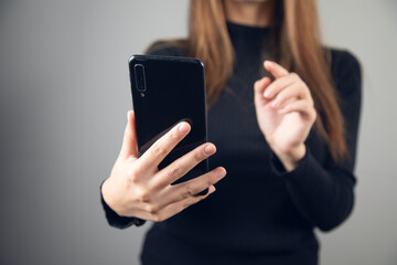 Hand Holding Mobile Cell Phone
