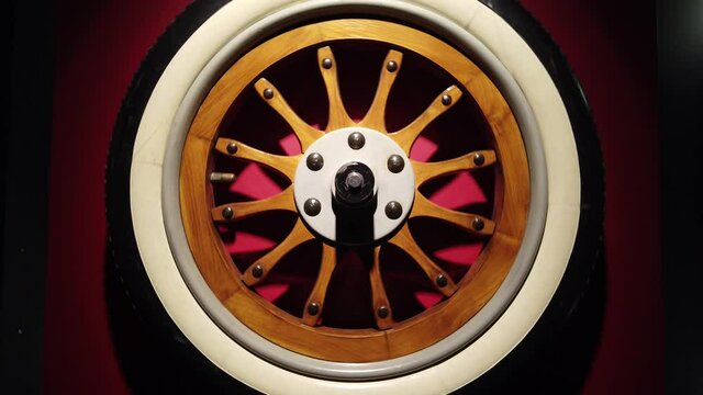4K video of an antique car wheel spinning
