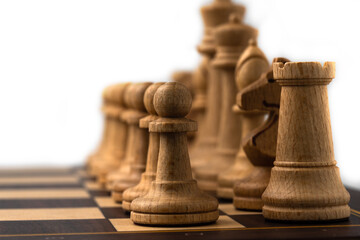 White chess stands on a chessboard close up