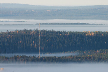 Communication tower in the middle of Northern landscape in Finland. 