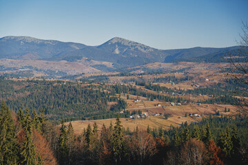 Views of the neighboring mountains from the Kukul ridge. Ukrainian Carpathian mountains. Autumn in the mountains.