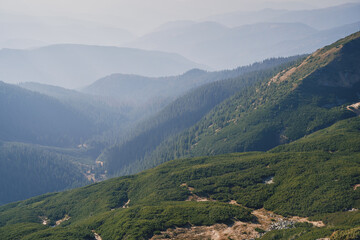 Naklejka premium Views of the neighboring mountains from the Kukul ridge. Ukrainian Carpathian mountains. Autumn in the mountains.