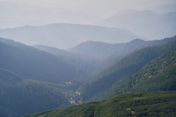 Views of the neighboring mountains from the Kukul ridge. Ukrainian Carpathian mountains. Autumn in the mountains.