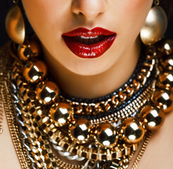 beauty rich woman with bright makeup wearing luxury jewellery on black background, fashion lady