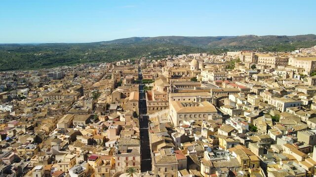 Aerial view of Cathedral of Noto (La Chiesa Madre di San Nicol&ograve;), UNESCO world heritage site and example of sicilian baroque. Drone flies above the Cathedral of Noto in the central street