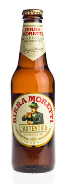 Bottle of Moretti pilsener beer isolated on white