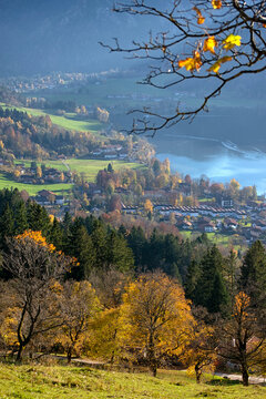 Beautiful view of Schliersee city with the lake as a background during Autumn. Mountain lake Schliersee during Fall and a small city in german Alps, Bavaria, Germany