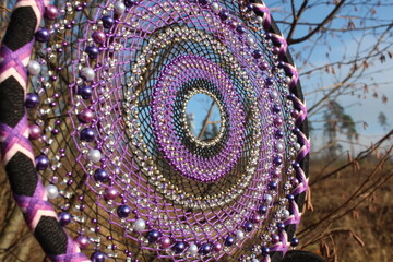 Beautiful purple dreamcatcher. Indian amulet against bad dreams.