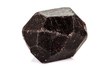 macro mineral stone  Garnet, on a white background